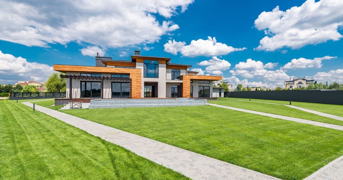 Modern residential house with landscaped lawn in Lahore